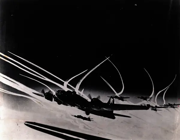 B-17Fs of the 390th Bomb Group with fighter contrails, 1943, photographed by Sgt. Stanley M. Smith (not Magee’s plane)