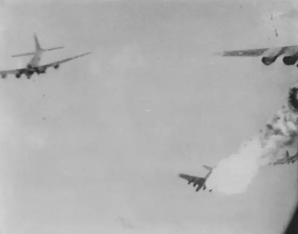 A B-17 hit by flak bursts into flames over Ploesti, Romania, 1944 (not Magee’s plane)