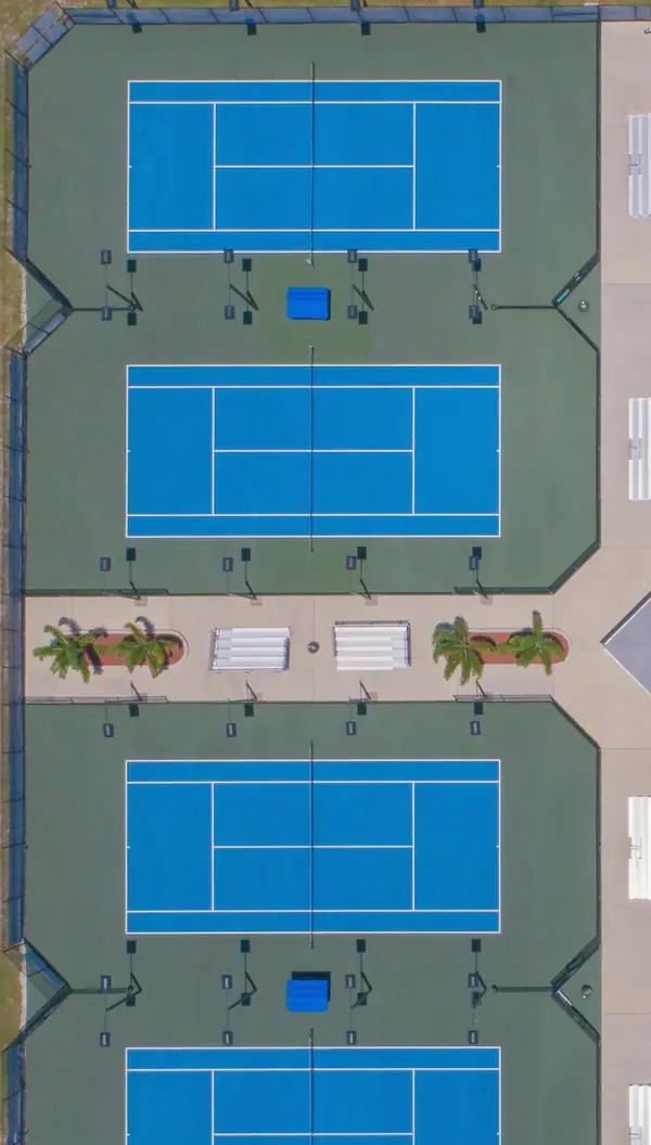 Tennis courts at the Titan Tennis Center, Melbourne, Florida, from a drone, June 25, 2017 (cropped; a stand-in)