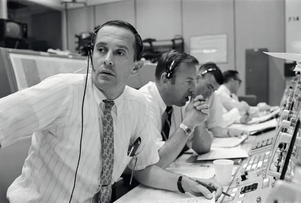Duke, Lovell and Haise at the Apollo 11 Capcom, Johnson Space Center, Houston, Texas - 19690720