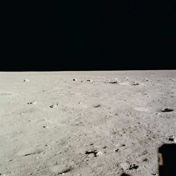 View form Lunar Module of surface of the moon near where LM touched down (as11-37-5458)