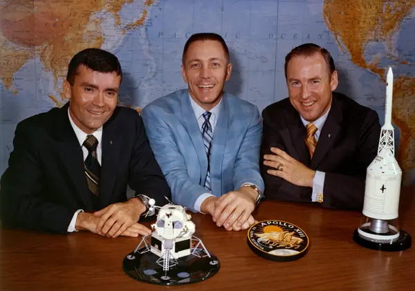 Fred Haise (left), Jack Swigert, and Jim Lovell pose on the day before launch