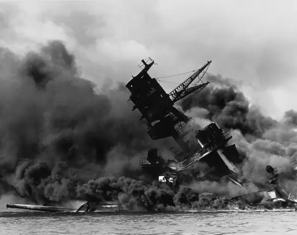 The USS Arizona burning after the Japanese attack on Pearl Harbor, December 7, 1941