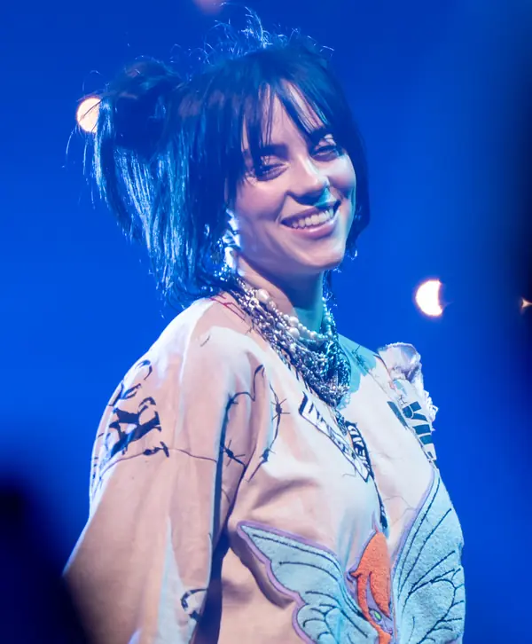 Billie Eilish smiling on stage at The O2, London, June 16, 2022 (not the 2020 Grammys)