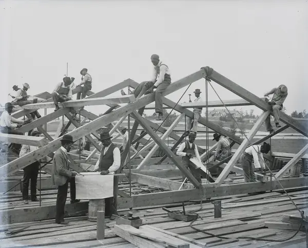Students building a roof at Tuskegee Institute, photographed by Frances Benjamin Johnston, about 1902