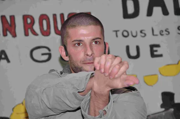 Darcy Oake, hands together, at the “All That Glitters” charity gala, May 7, 2010 (not the 2019 show)