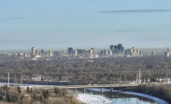 The Winnipeg skyline across the river valley, March 24, 2025