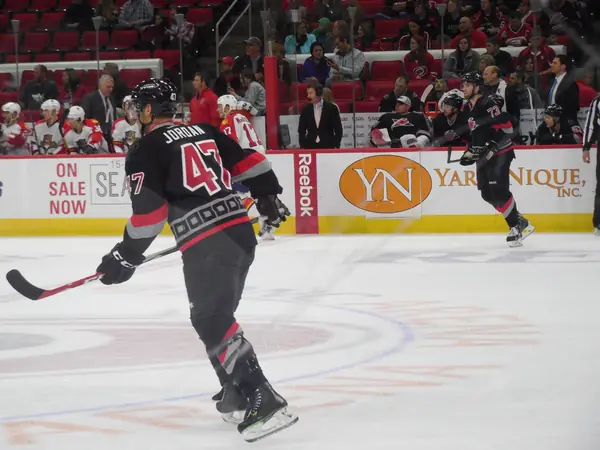 A Carolina Hurricanes player against the Florida Panthers at PNC Arena, Raleigh, March 14, 2015 (not the 2020 game)