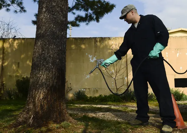 Tech. Sgt. Adrian Pozo-Romero, an Air Force pest-control technician, spraying at Aviano Air Base, Italy, March 23, 2015 (not Goggins)
