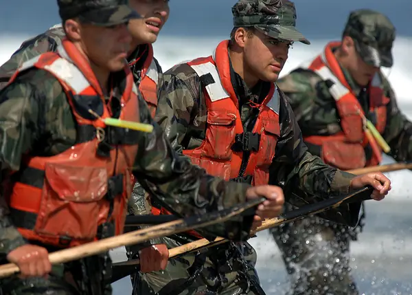 BUD/S students race out of the surf after the last exercise of Hell Week, Coronado, June 6, 2008 (not Goggins)