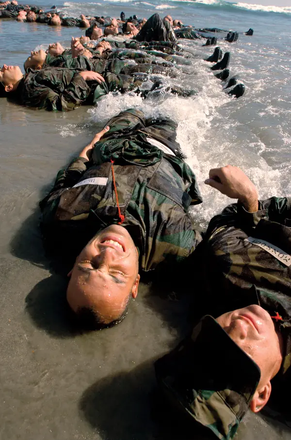 Candidates lying in the surf at Coronado, August 2004 (not Goggins)