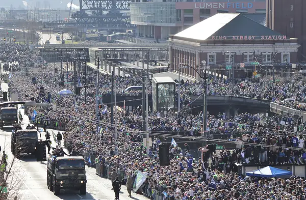 The Seahawks’ Super Bowl LX victory parade crowd on 4th Avenue, Seattle, February 11, 2026