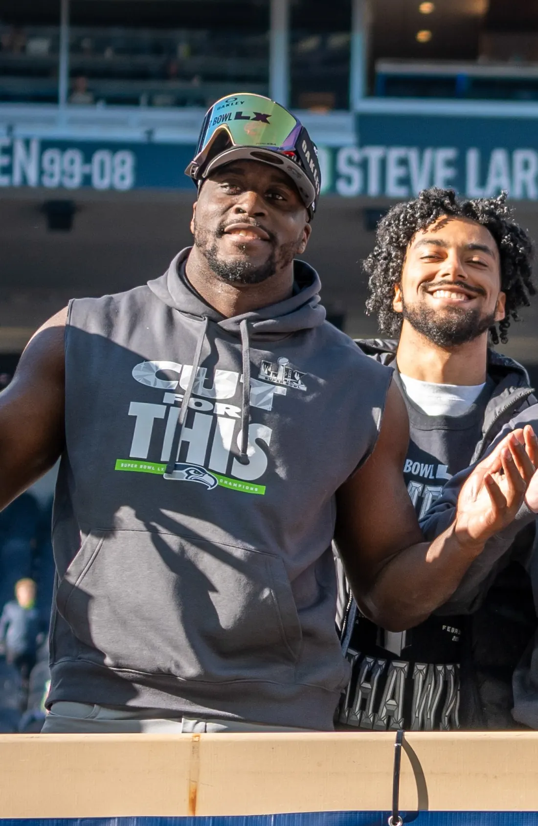 Derick Hall on the defensive and special teams coaches’ float at the Seahawks’ Super Bowl LX victory celebration, Lumen Field, Seattle, February 11, 2026 (cropped; three days after the game, not the strip-sack)