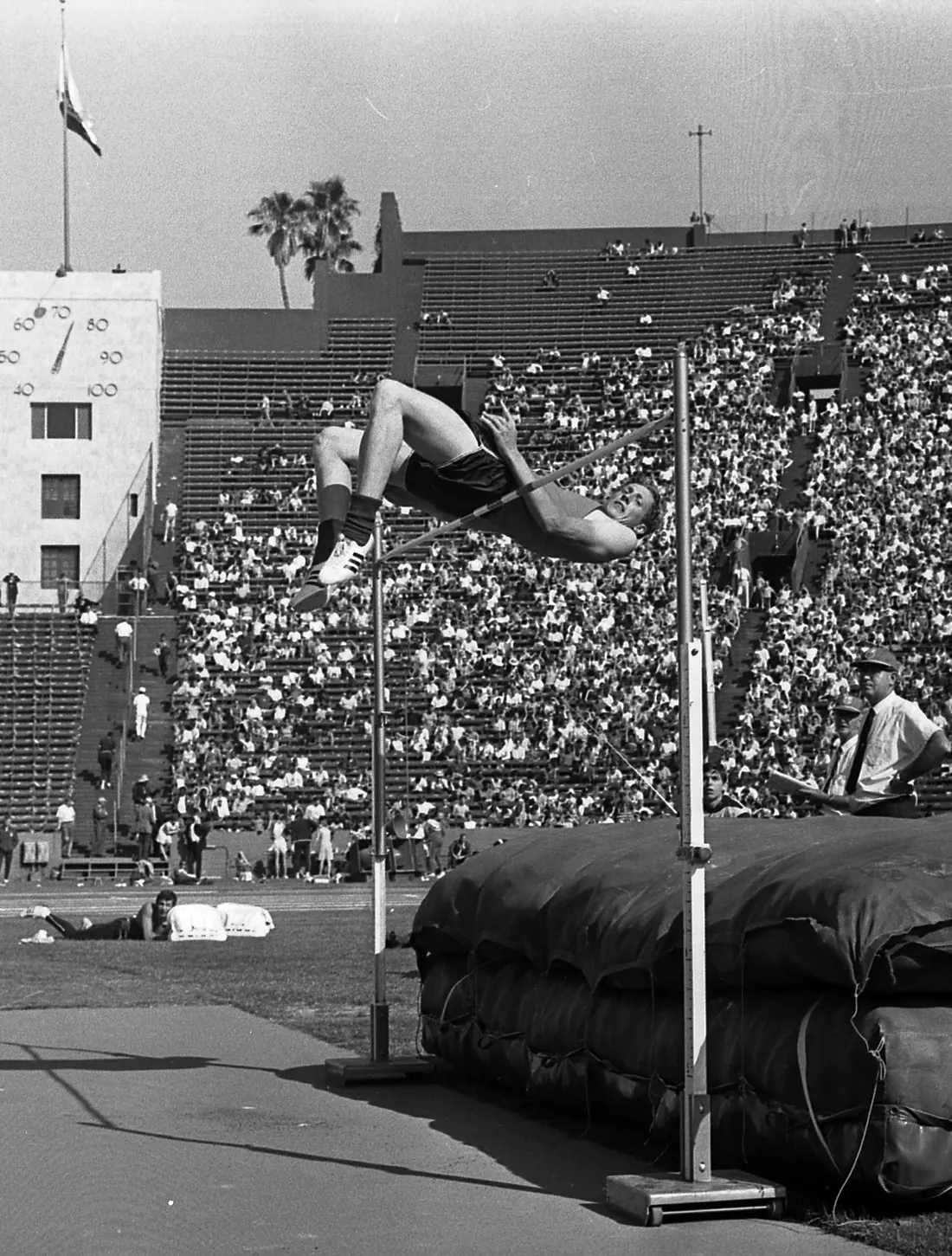 Dick Fosbury clears the bar at the 1968 US Olympic trials, Los Angeles Memorial Coliseum (not the Mexico City final)