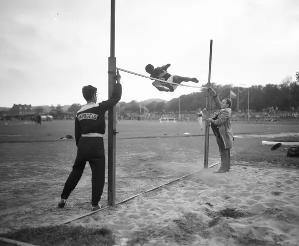 A high jump into a sand pit, The Hague v London, 1961 (not Fosbury)