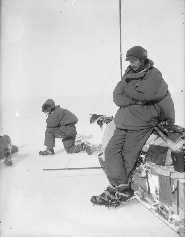 Mawson resting on a sledge in Adelie Land, photographed by Xavier Mertz, 1912 (an earlier journey, not the Far Eastern Party)