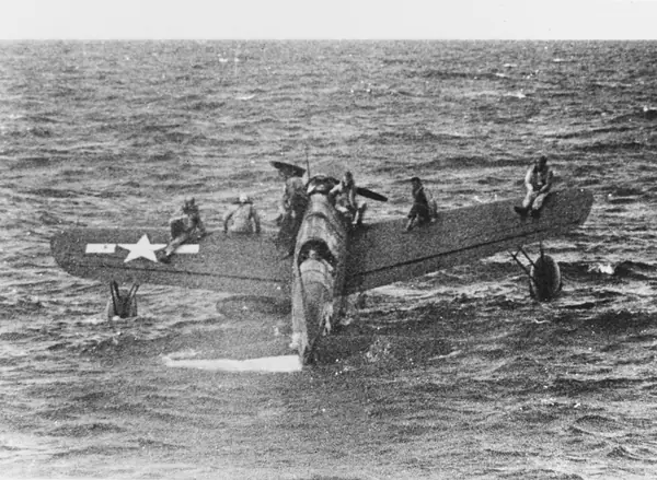A US Navy OS2U Kingfisher with rescued airmen on its wings, off Truk, May 1, 1944 (not Rickenbacker’s rescue)