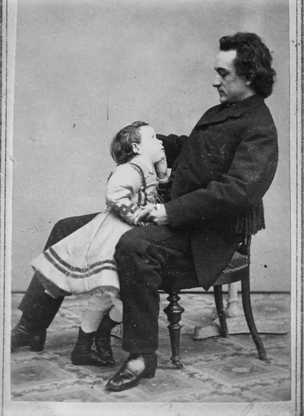Edwin Booth with a child, probably his daughter Edwina, 1860s