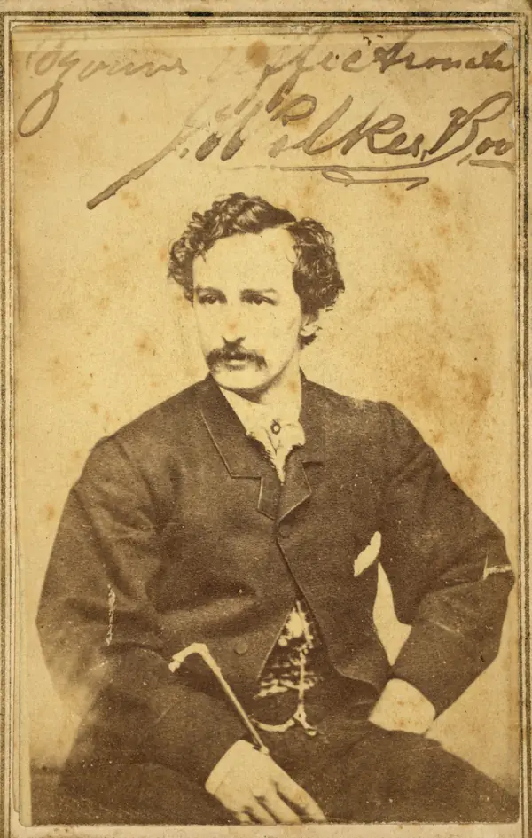 John Wilkes Booth, Edwin’s brother, autographed studio portrait, early 1860s