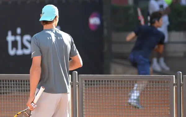 Rafael Nadal watching Roger Federer practice at the Internazionali BNL d’Italia, Rome, May 2015