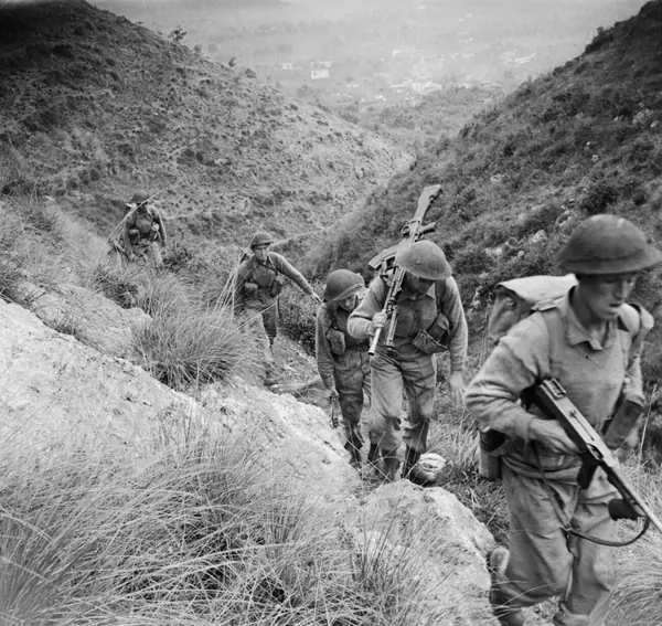 Men of the 10th Royal Berkshire Regiment move up to the heights of Calvi Risorta, Italy, October 27, 1943 (not the day of his flight)