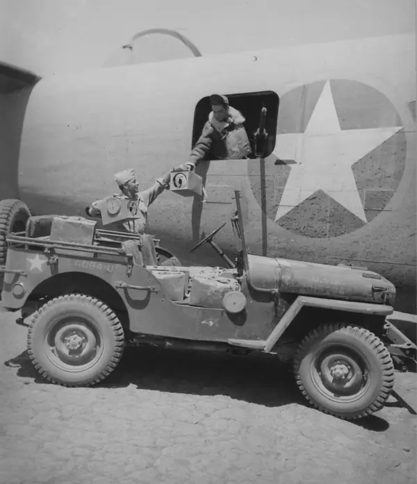 Homing pigeons delivered to a 376th Bomb Group bomber before a mission, near Benghazi, Libya, 1943 (not G.I. Joe or his air base)