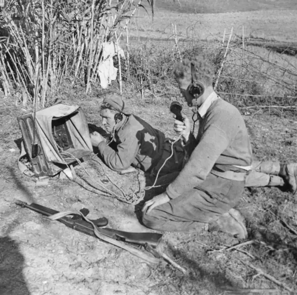 British troopers use a radio at an observation post above the Sangro, Italy, November 7–8, 1943 (not the radio that failed)