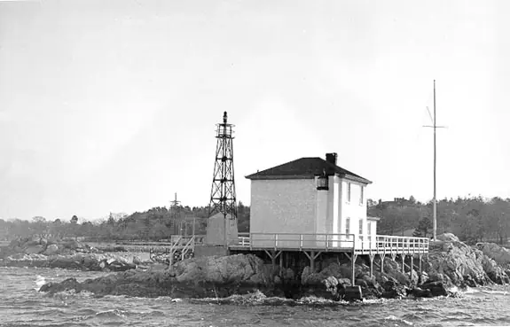 The Ida Lewis (Lime Rock) Lighthouse station with its skeleton light tower, in a later US Coast Guard photo