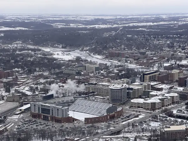 Kinnick Stadium and the round hospital tower next to it, from the air, February 18, 2025