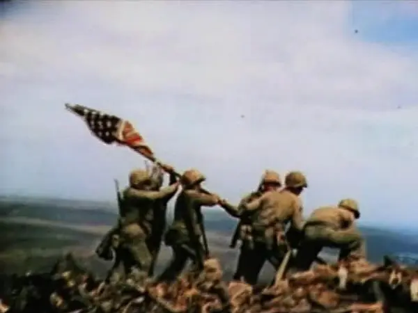 A frame of Sgt. Bill Genaust’s US Marine Corps color film of the second flag raising, February 23, 1945