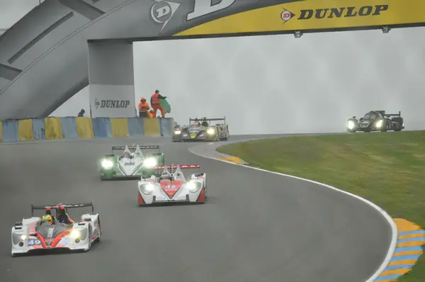 LMP2 cars under the Dunlop bridge at Le Mans, car 42 among them, June 22, 2013