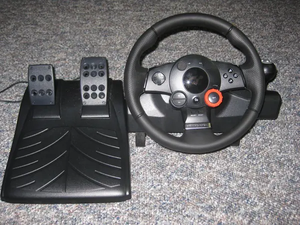 A Logitech Driving Force GT racing wheel and pedals, 2011 (not his)