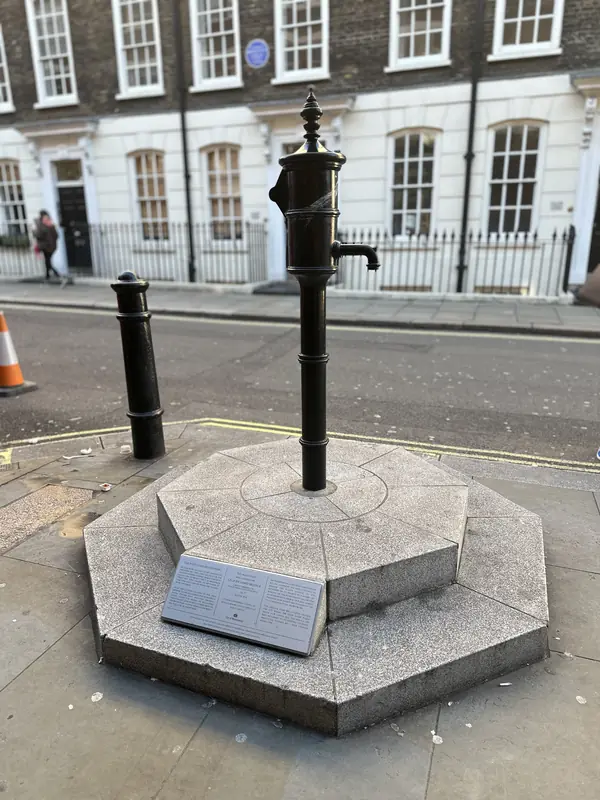 The replica pump, with no handle, on Broadwick Street (once Broad Street), 2023