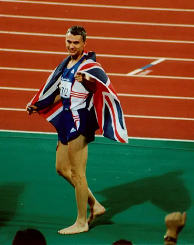 Jonathan Edwards with the Union flag after winning Olympic gold, Sydney, September 25, 2000 (not 1995)
