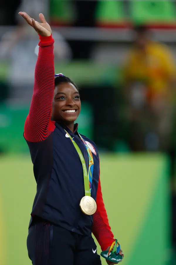 Simone Biles with her team gold medal at the Rio 2016 Olympics, August 9, 2016 (not the 2013 American Cup)