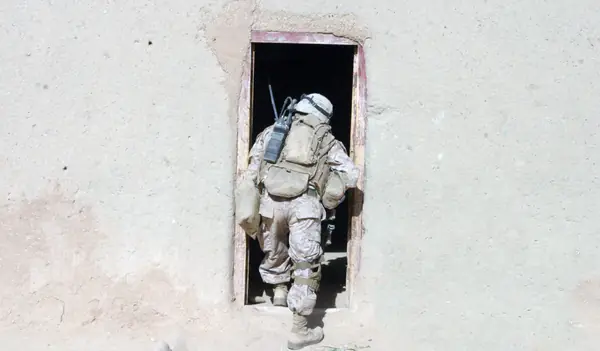 Cpl. Sol N. Schilling of 2nd Battalion, 9th Marines enters a compound in northern Marjah, October 21, 2010 (not Kyle Carpenter)