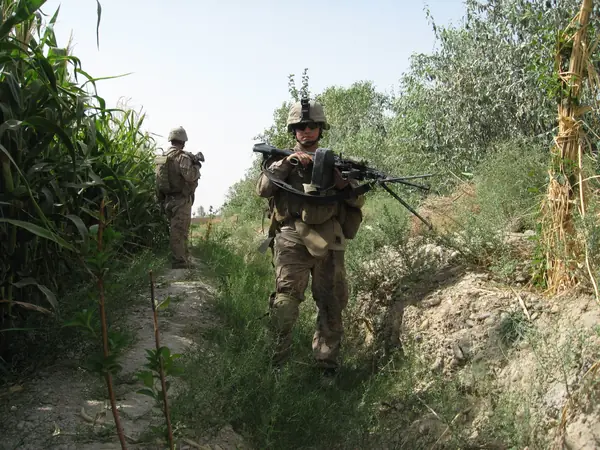 Lance Cpl. Kyle Carpenter (foreground) on patrol in Helmand province, Afghanistan, August 2010