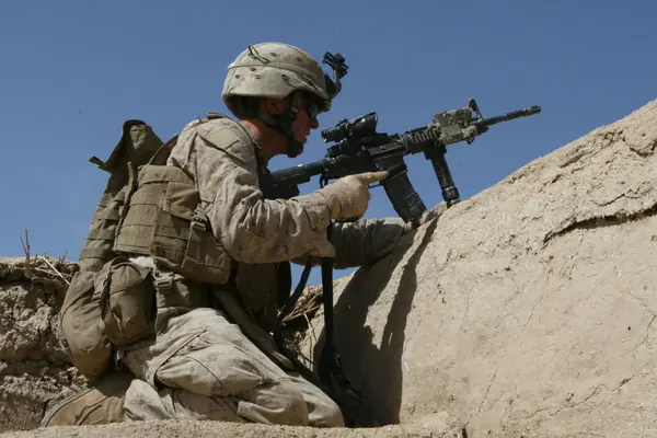 A Marine of 1st Battalion, 6th Marines on rooftop security in Marjah, February 17, 2010 (not Kyle Carpenter)