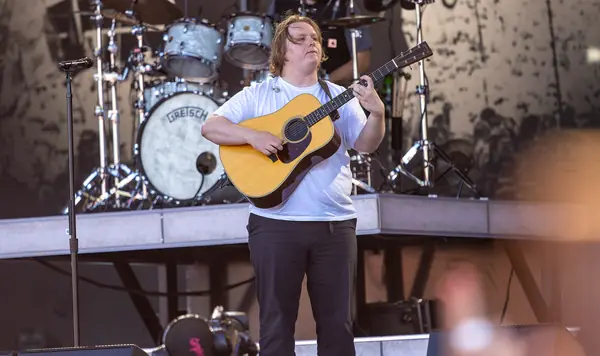 Lewis Capaldi with an acoustic guitar during his set, Pyramid Stage, Glastonbury, June 24, 2023