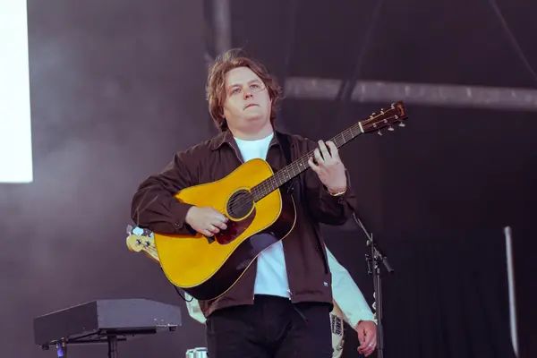 Lewis Capaldi with an acoustic guitar during his return set, Pyramid Stage, Glastonbury, June 27, 2025