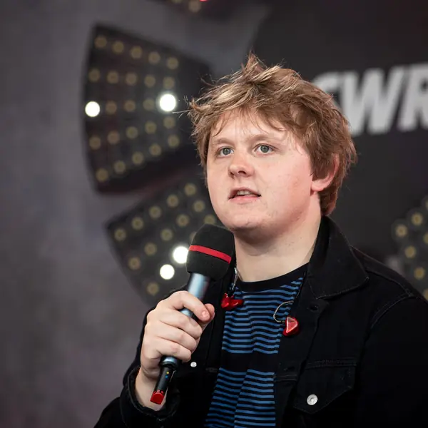 Lewis Capaldi speaking into a microphone at the SWR3 New Pop Festival, Baden-Baden, September 13, 2019 (not Glastonbury)