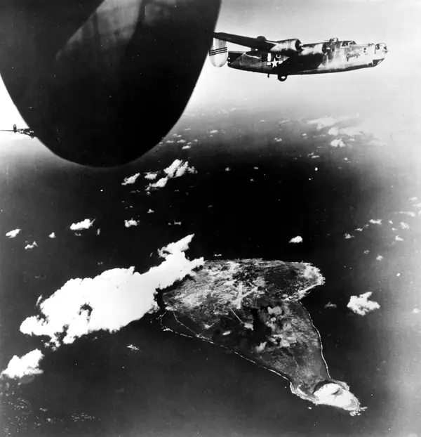 B-24 Liberators of the 11th Bombardment Group, Zamperini’s group, over Iwo Jima, December 15, 1944 (not his bomber)