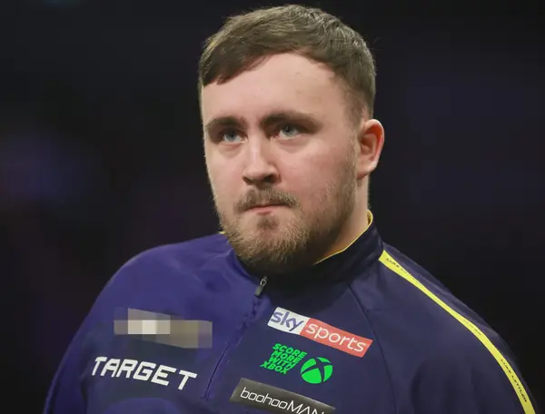Luke Littler at a Premier League Darts night, Uber Arena, Berlin, April 3, 2025 (cropped; logo pixelated; not a World Championship)