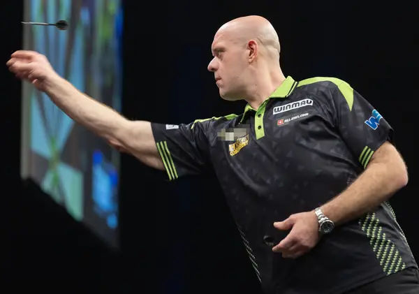 Michael van Gerwen throwing at a Premier League Darts night, Berlin, March 26, 2026 (cropped; logo pixelated; not the 2025 world final)