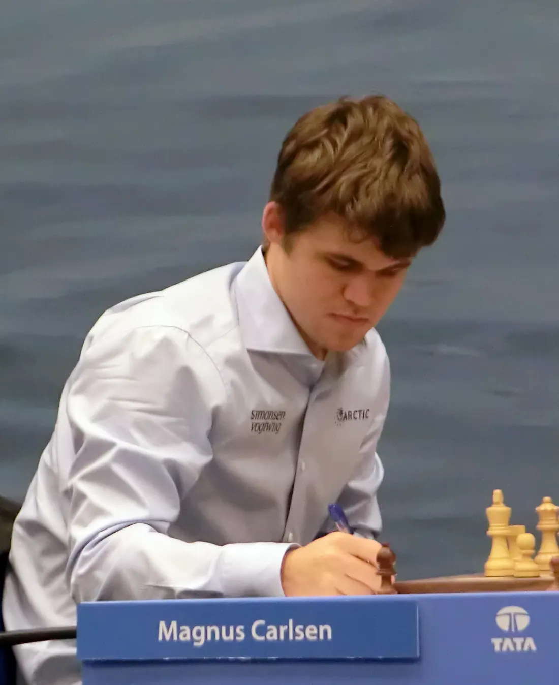 Magnus Carlsen writing a move, Tata Steel tournament, Wijk aan Zee, January 2013 (not Harvard)
