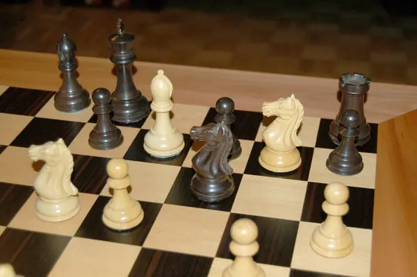 Boxwood Staunton pieces in a middlegame, 2007 (a stand-in, not the Harvard boards)