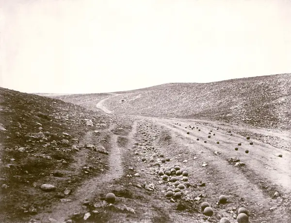 Roger Fenton’s “The Valley of the Shadow of Death,” cannonballs on a road in the Crimea, April 23, 1855