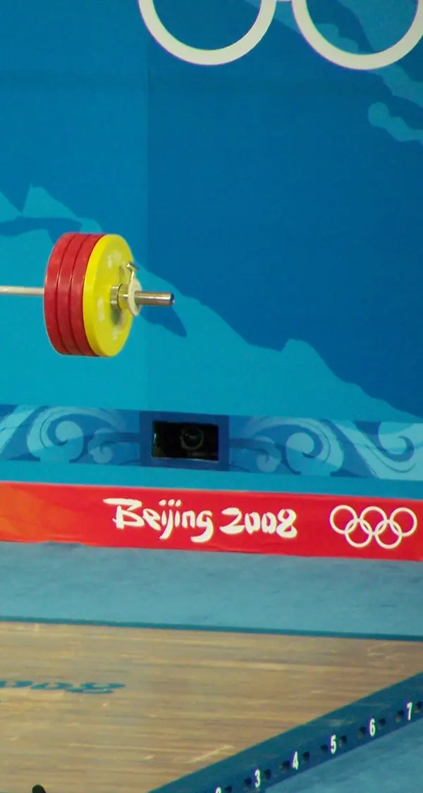 A loaded bar on the Beijing 2008 Olympic platform, August 17, 2008 (cropped; the lifter, Jürgen Spieß, is not Steiner)