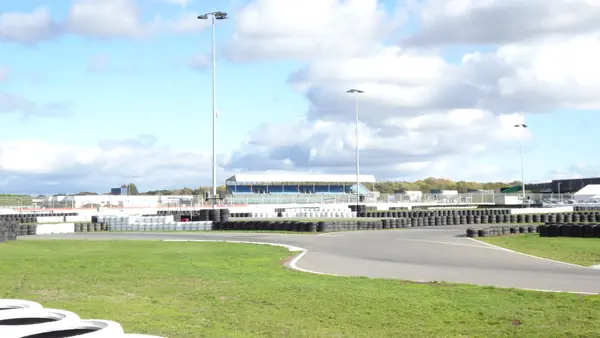 Kart Silverstone with a Silverstone grandstand behind it, October 22, 2026 (not the race)