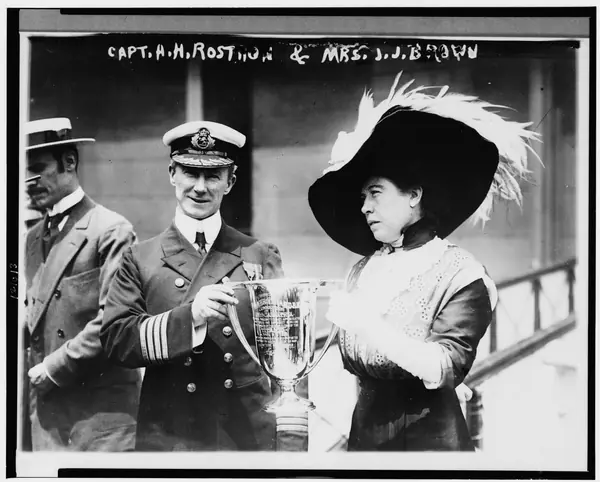 Capt. A. H. Rostron and Margaret Brown (Mrs. J. J. Brown) with the survivors’ loving cup, May 29, 1912